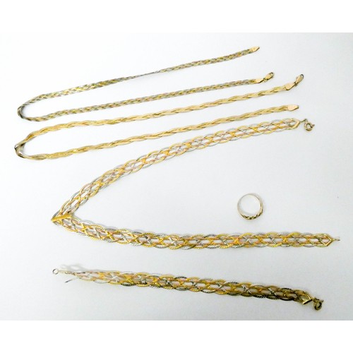 581 - A collection of tri colour 9ct gold plaited chain necklaces and bracelets, and a keeper ring. Weight... 