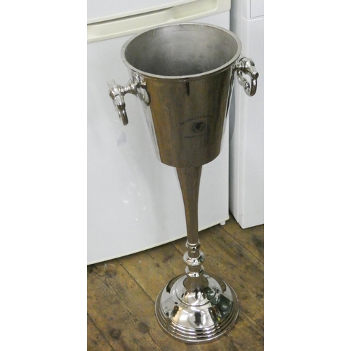 19 - A plated floor standing ice bucket...