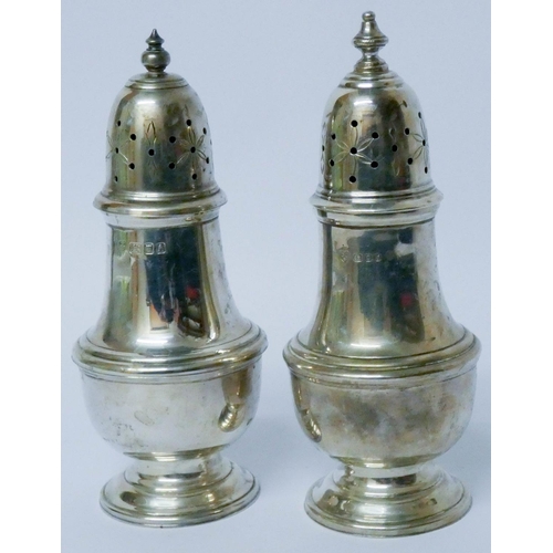 604 - A near pair of modern silver sugar casters, London marks 1963/4.  Weight 8.25 troy ounces...