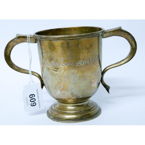 609 - A hallmarked silver twin handled trophy cup, weight 6.8 troy ounces...