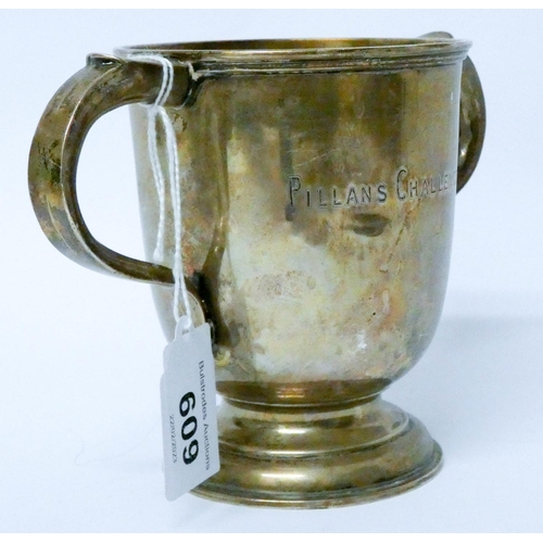 609 - A hallmarked silver twin handled trophy cup, weight 6.8 troy ounces...