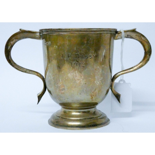 609 - A hallmarked silver twin handled trophy cup, weight 6.8 troy ounces...