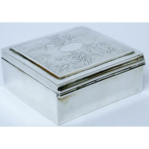 613 - Malaysian silver cigarette box, with bamboo decoration to the hinged lid, marked on base. 9.5 cms ac...