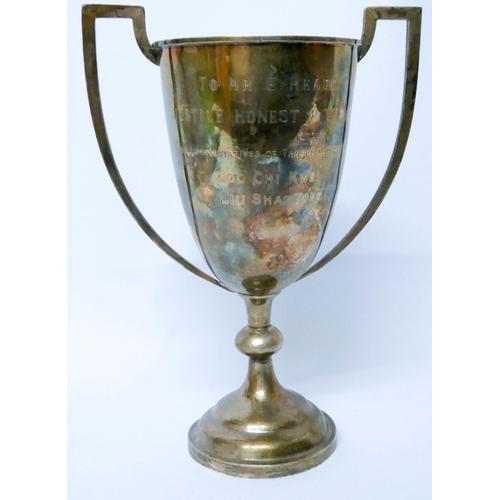 616 - Chinese white metal twin handled trophy cup, with presentation inscription. 11.6 troy ounces....