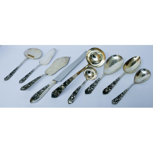 618 - Chinese white metal serving spoons, cake slices, ladles and large carving knife, all marked 925 MD. ...