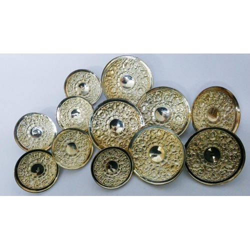 619 - A set of 12 Chinese white metal embossed dish or pot lids, all marked 925 MD, six size 11 cms diamet...