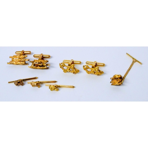 652 - Two Chinese yellow gold nugget effect cufflinks and shirt stud sets, Hallmarked LC K14, in silk purs...