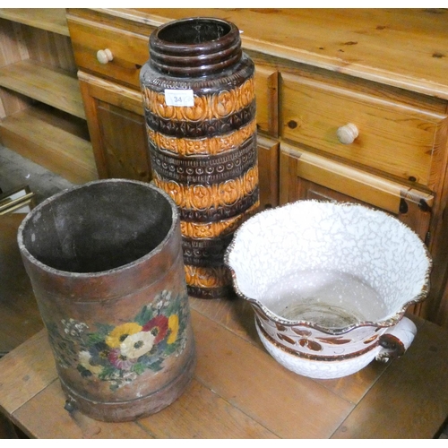 34 - A West German brown patterned vase, china jardinière and a waste bin...