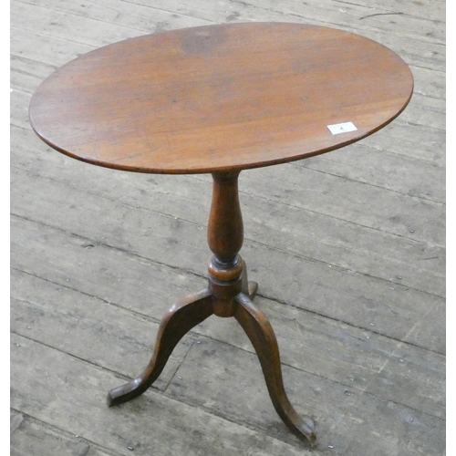 4 - A Victorian oval mahogany fold-over snap top occasional table on turned pillar and tripod base...