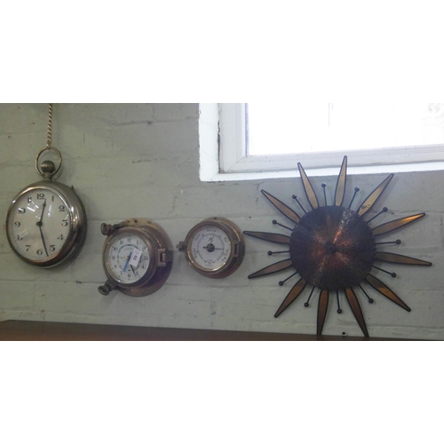 59 - A ships type clock and barometer, a watch style clock and a sun burst clock, four in the lot...