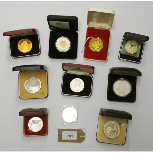 701 - A collection of 10 silver crown sized and medallions to include the first flight of Concord, the fir... 