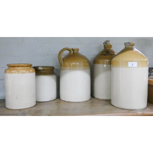 9 - A collection of five various old stoneware cider jars