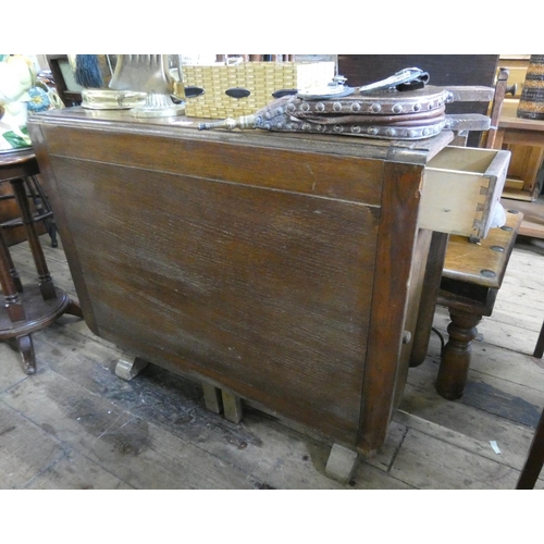 110 - An oak drop leaf dining table, 3' wide