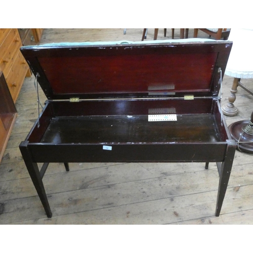 78 - An Edwardian mahogany duet stool with lift up upholstered seat