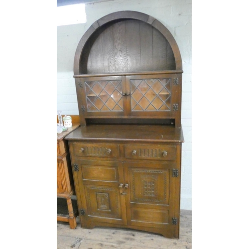 20 - An oak Dutch style dresser with lead light glazed back, drawers and cupboards under, 3' wide