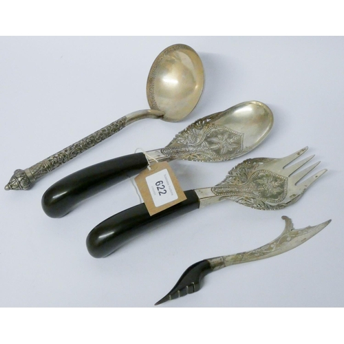 622 - A pair of Eastern white metal salad servers with ebony handles, a butter blade and an Oriental white...