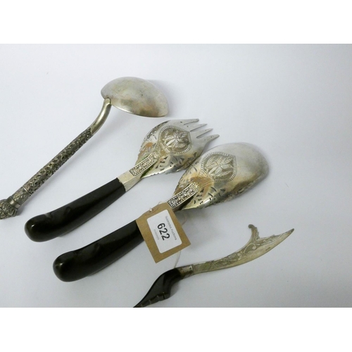 622 - A pair of Eastern white metal salad servers with ebony handles, a butter blade and an Oriental white...