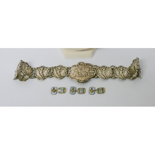 632 - A Victorian white metal belt decorated with Gainsborough cherubs, together with silver necklaces, en...