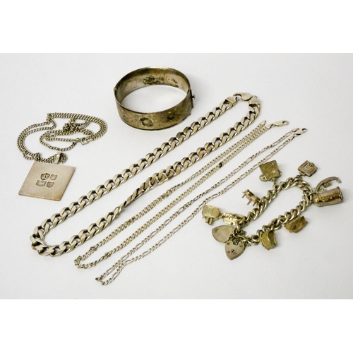 640 - A collection of silver jewellery - heavy neck chains, ingot pendant and hinged bangle etc, gross wei...