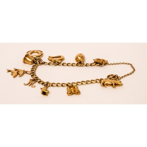 659 - 9ct yellow gold charm bracelet set numerous charms, including nautical motifs. Gross weight 13.3 gra...