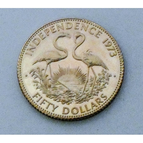 677 - Queen Elizabeth Bahamas 9ct gold $50 dollar coin, 1973. Weight 15.9 grams