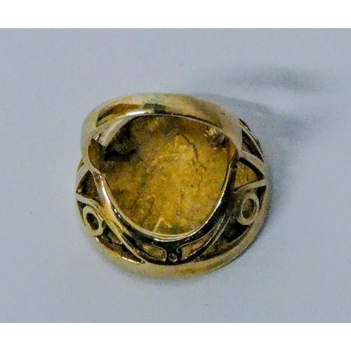 679 - Isle of Man Half Gold Sovereign 1973 mounted as a ring, on 9ct gold mount. Gross weight 8.3 grams, r... 