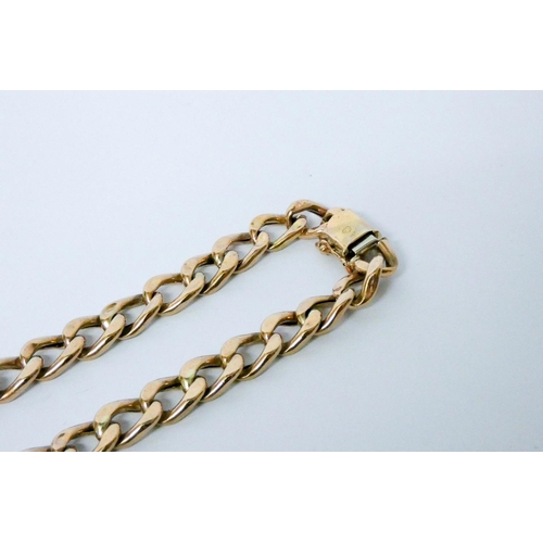 690 - A 9ct gold curb bracelet. 12.8 grams