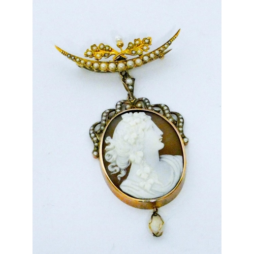 720 - Victorian carved shell cameo pendant, in a gold mount with seed pearl mount and dropper, suspended f... 