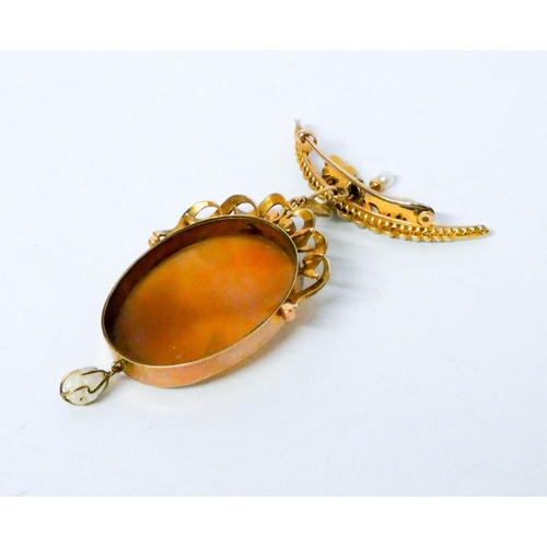 720 - Victorian carved shell cameo pendant, in a gold mount with seed pearl mount and dropper, suspended f... 