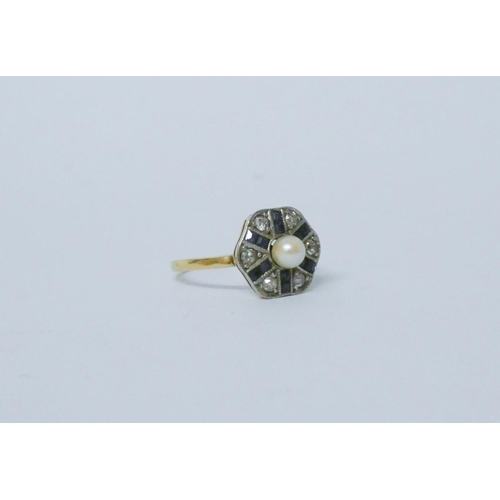 731 - An Art Deco ring, the octagonal panel set with sapphires, diamonds and a cultured pearl to the centr... 