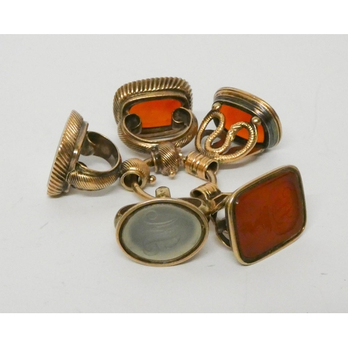 738 - A collection of five 19th century large intaglio panel fob seals, all contained on a bolt ring, gros... 