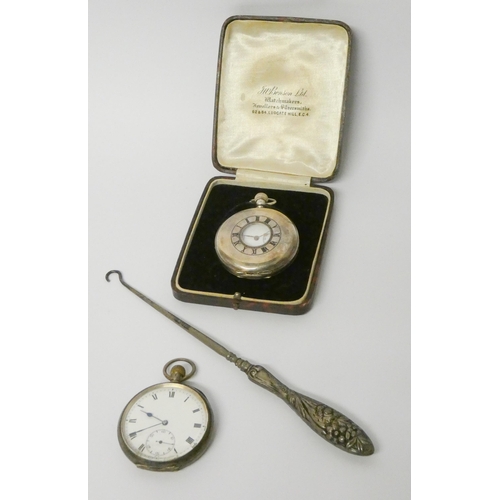 712 - Victorian silver half hunter pocket watch, another silver open face pocket watch and a silver handle... 