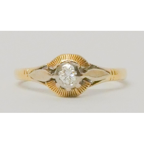 744 - An 18ct gold diamond ring, within a circular setting, hallmarked, ring size O