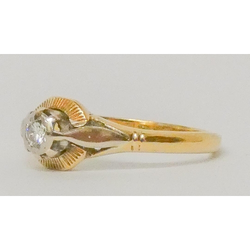 744 - An 18ct gold diamond ring, within a circular setting, hallmarked, ring size O