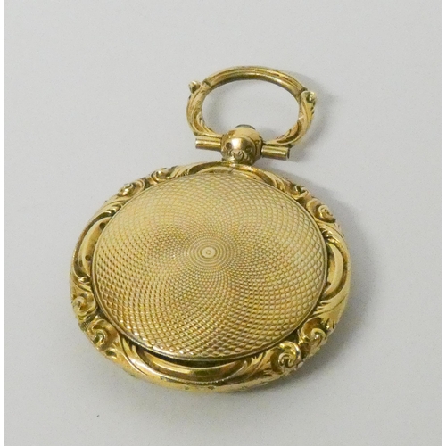 761 - A late Victorian circular gold locket, with hinged lid opening to reveal glazed locket compartment, ... 