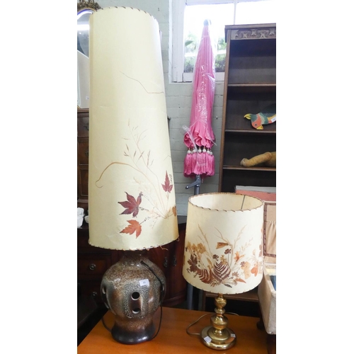 49 - A large china table lamp with shade and a brass table lamp with shade