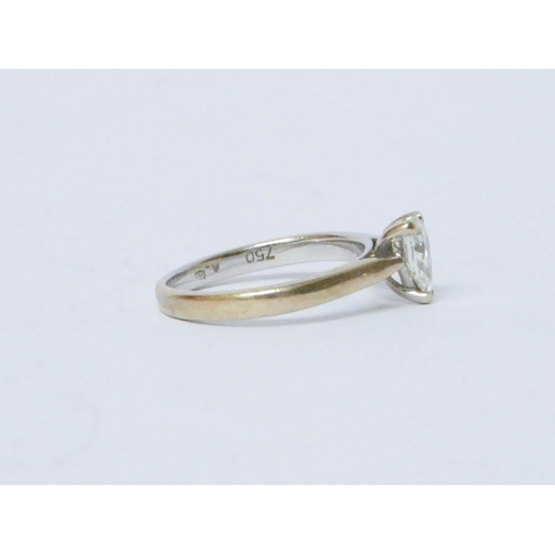 773 - A modern pear shaped diamond engagement ring, claw set diamond on an 18ct white gold band, Hallmarke... 