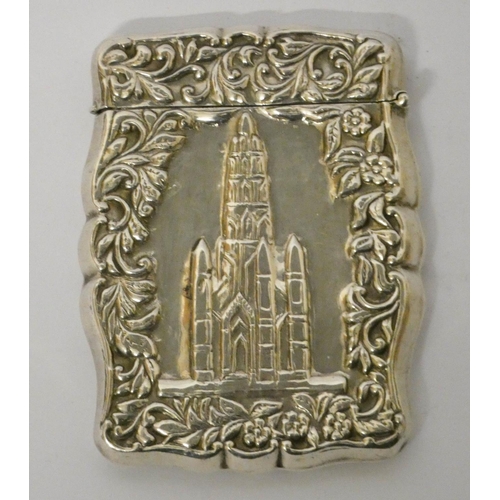 644 - A silver card case, with embossed cathedral style decoration, marked 925 Sterling....