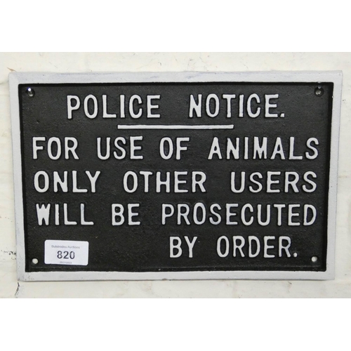 816 - An 'Animals Only' cast iron wall hanging sign