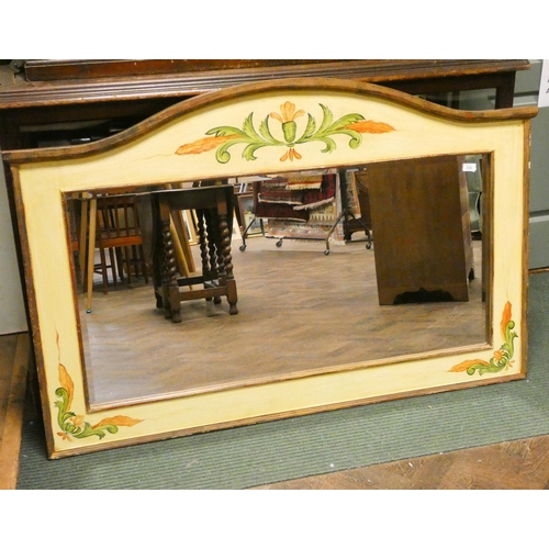 338 - A large bevelled wall or over mantle mirror in cream and floral painted frame