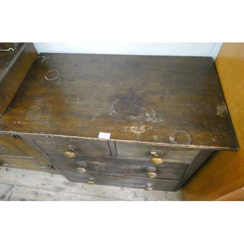 29 - Victorian style stained pine chest of two long and two short drawers with bun handles, 2'9 wide