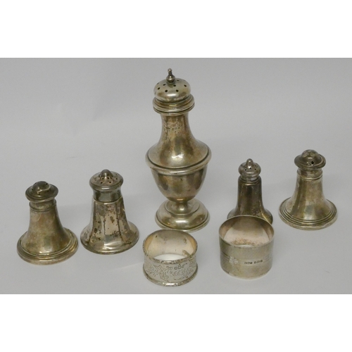 521 - A collection of small silver ware - sugar shaker, napkin rings, condiments etc.