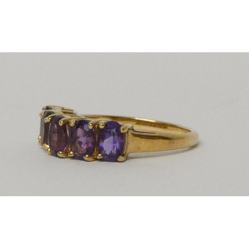 574 - 9ct yellow gold five stone amethyst half hoop ring, hallmarked, ring size N