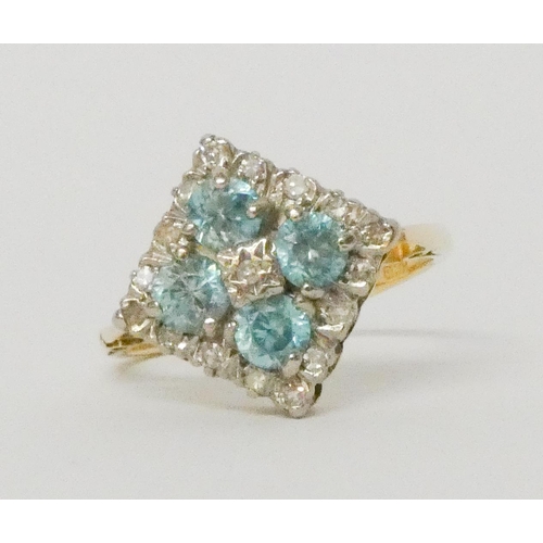 580 - 18ct yellow gold diamond and blue stone cluster dress ring, hallmarked, ring size N