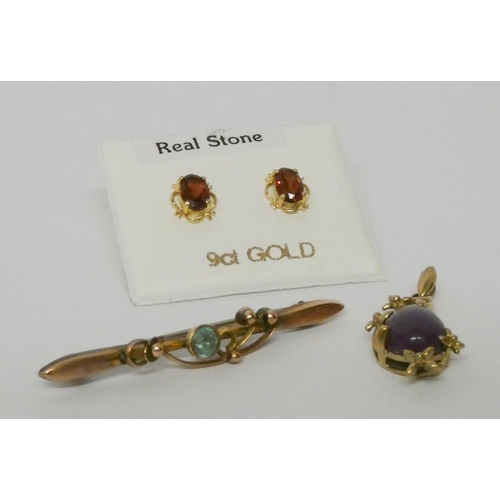 584 - A pair of garnet 9ct gold ear studs, a 9ct gold pendant and an Edwardian bar brooch marked 9ct.