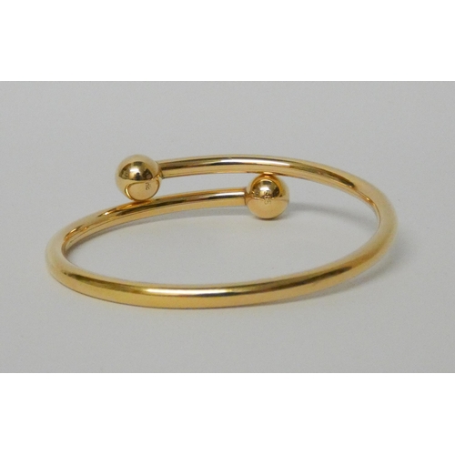 609 - Hans Hansen Danish 14ct gold Torque bangle, 11.9gms