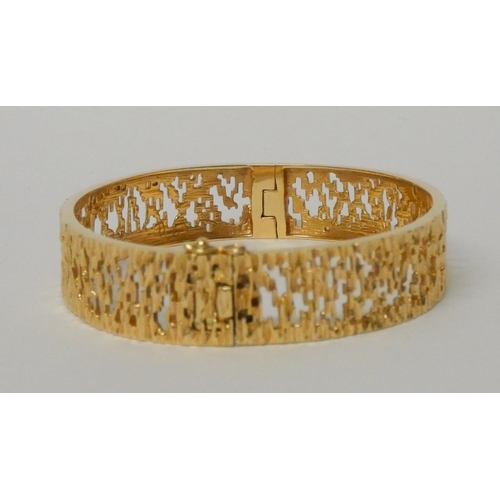 610 - Danish 14ct yellow gold bark effect bangle, 28.1gms