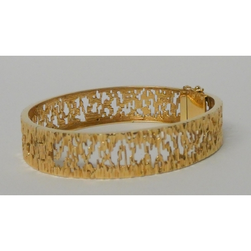 610 - Danish 14ct yellow gold bark effect bangle, 28.1gms