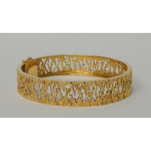 610 - Danish 14ct yellow gold bark effect bangle, 28.1gms