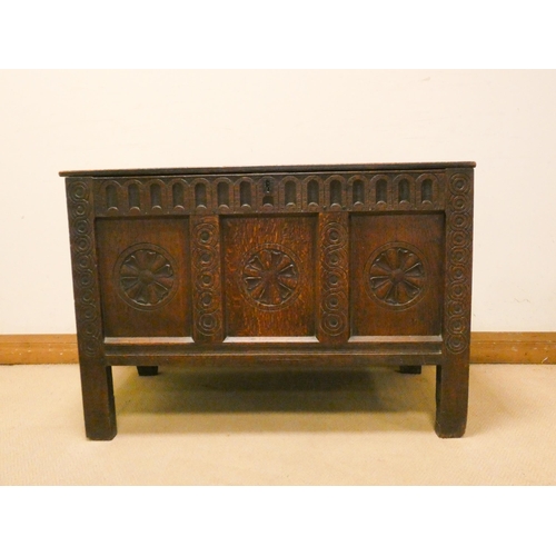 467 - An antique oak carved three panel coffer, 3'6 wide, 29